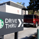 Customers line up in a drive thru at a Starbucks store on October 29, 2021 in Novato, California.